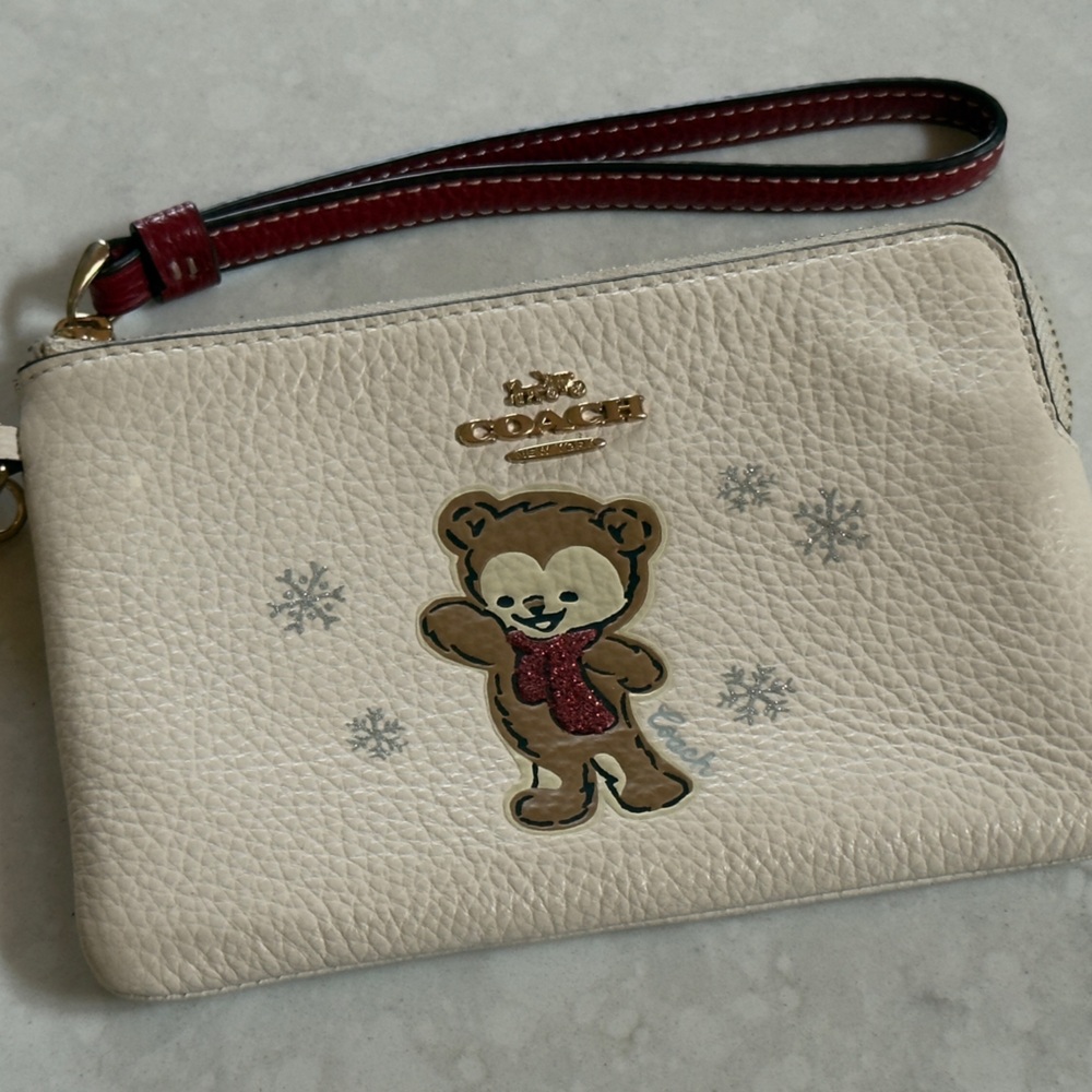 Coach Beige Wristlet with Bear Motif